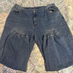 Dark blue denim baggy jeans.